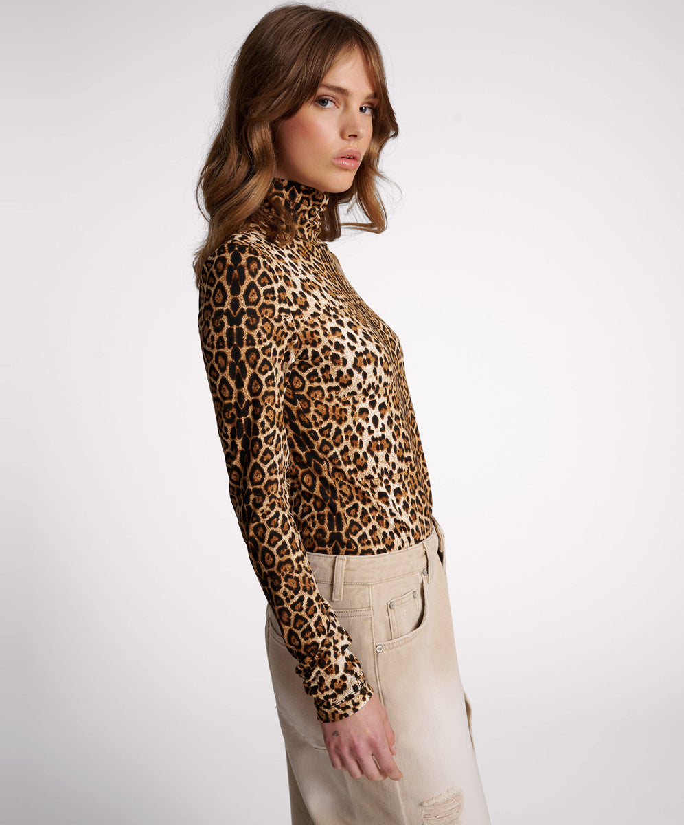 Animal print turtleneck top deals